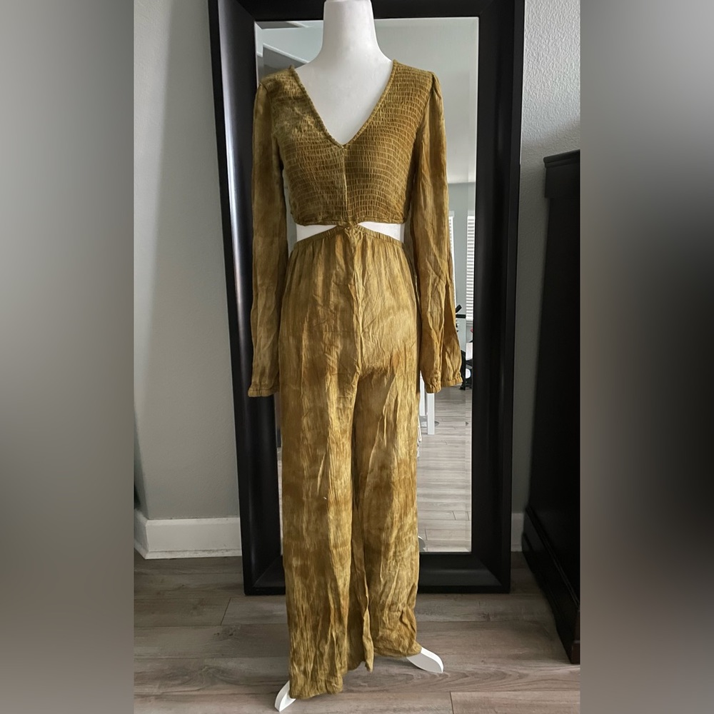 Women jumpsuit/Never worn, bought 5 months ago/small